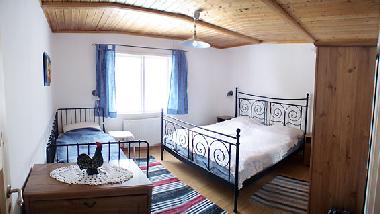Dreibett-Schlafzimmer