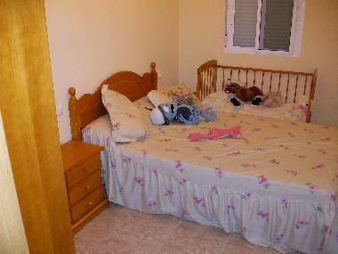 Doppelzimmer mit Babybett
