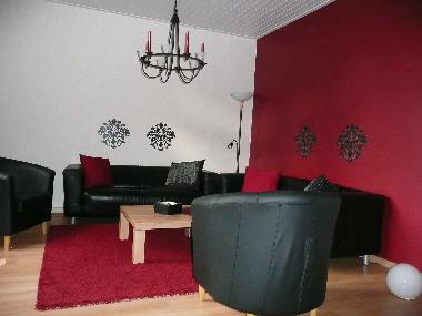 Gem�tlicher Wohnbereich mit Flat TV 82 cm