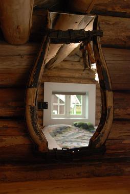 Das Schlafzimmer mit  Ausblick zum Garten.