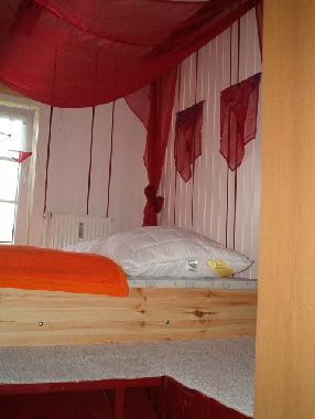 Schlafzimmer mit Himmelbett