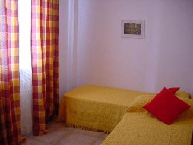 Schlafzimmer mit 3 Betten