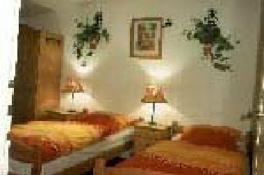   .....  ein Schlafzimmer im Kutscherhaus Casa Chabeli