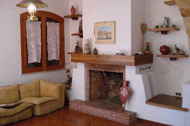 Wohnzimmer mit Kamin