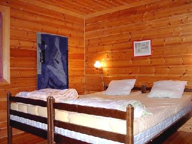 Lavskrikan Schlafzimmer mit Doppelbett