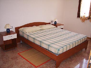 Schlafzimmer mit Ehebetten