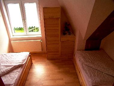 Das zweite Schlafzimmer mit getrennten Betten