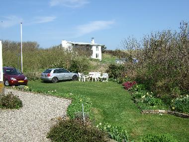 Aussicht auf den Garten und auf die Duenen