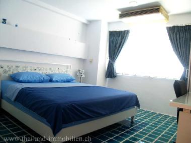 Schlafzimmer mit Doppelbett