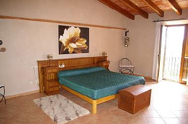 Der Masterbettroom mit Bad en Suite