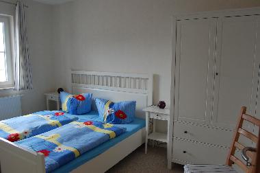 Schlafzimmer mit Doppelbett