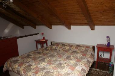 Schlafbereich mit Doppelbett