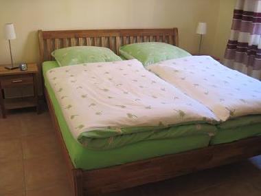 Schlafzimmer mit Doppelbett