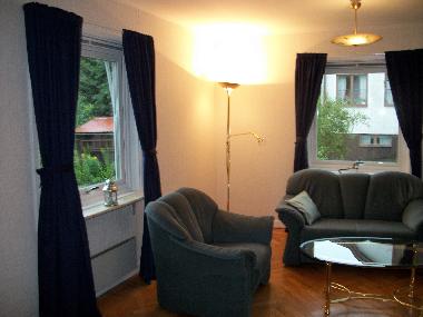Wohnzimmer mit Sat Fernsehen und Stereoanlage