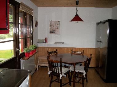 Essecke in der K�che mit Ausgang zur Veranda