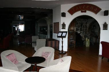 Hotelbar und Eingang zum Restaurant TAVERNA im Carlton Hotel