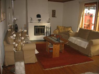 Wohnzimmer mit Karmin, Ferienhaus Solgarden