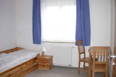 schlafzimmer mit Rollbett