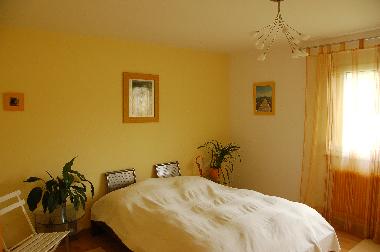 Yellow bedroom 1st floor apartment