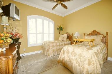 guest bedroom with 2 twin beds