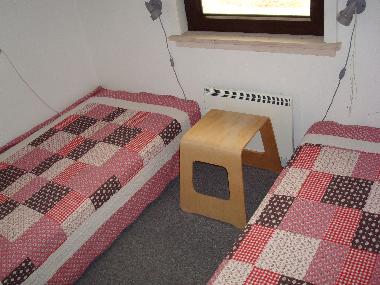 Schlafzimmer 4 mit zwei Einzelbetten