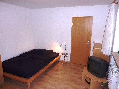 Schlafzimmer mit Doppelbett