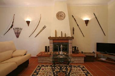 Wohnzimmer mit Kamin