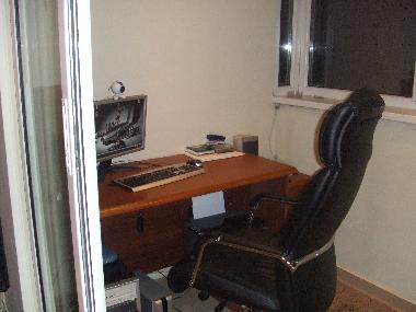 Integrierter verglaster Balkon zum Wohnzimmer=Computerbereich