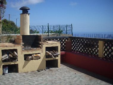 der Barbequegrill , Sitzgelegenheit gegen�ber
