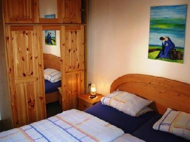 Schlafzimmer mit Doppelbett