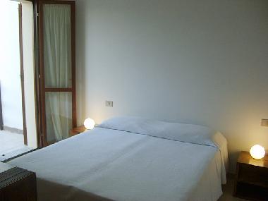 Das Schlafzimmer mit Ehebetten