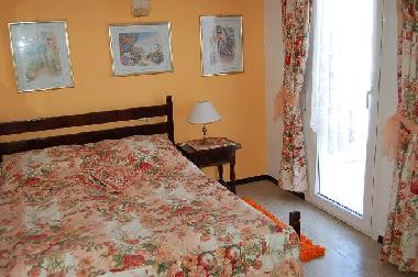 Schlafzimmer mit Balkon