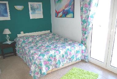 Schlafzimmer mit Balkon