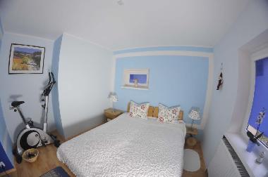 Schlafzimmer mit Fitnessecke