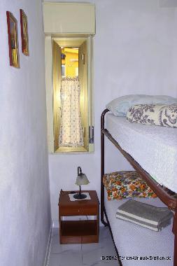 Das kleine Schlafzimmer mit Etagenbett