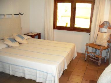 Schlafzimmer mit Doppelbett