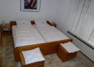 das Schlafzimmer