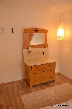 Komone im Schlafzimmer