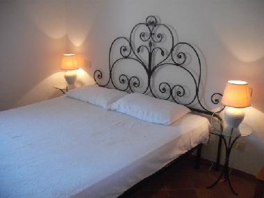 Schlafzimmer mit Doppelbett