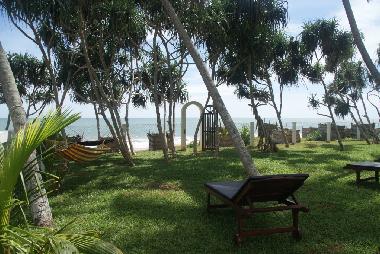 Ausgang vom Grundstck zum weiten Sandstrand