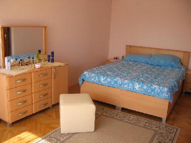 Schlafzimmer mit Balkon