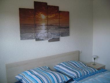 Schlafzimmer mit Doppelbett
