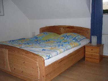 Schlafzimmer mit Doppelbett.....