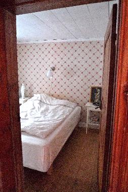 Schlafzimmer mit Doppelbett im Haus 1 