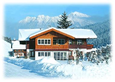 Haus Narzisse mit Nebelhorn im Hintergrund