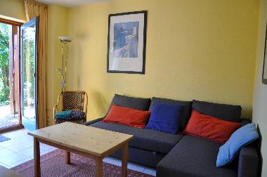 Wohnzimmer mit Schlafsofa