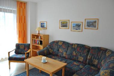 Wohnzimmer mit Schlafsofa