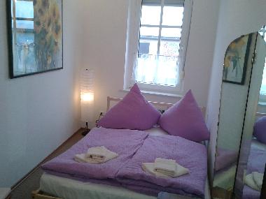 Ein weiteres Schlafzimmer mit Doppelbett im EG
