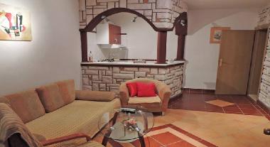 Wohnzimmer-K�che-Gro�e Terrasse mit Grill