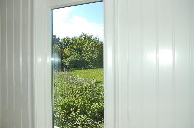 Wiese aus dem Schlafzimmerfenster gesehen